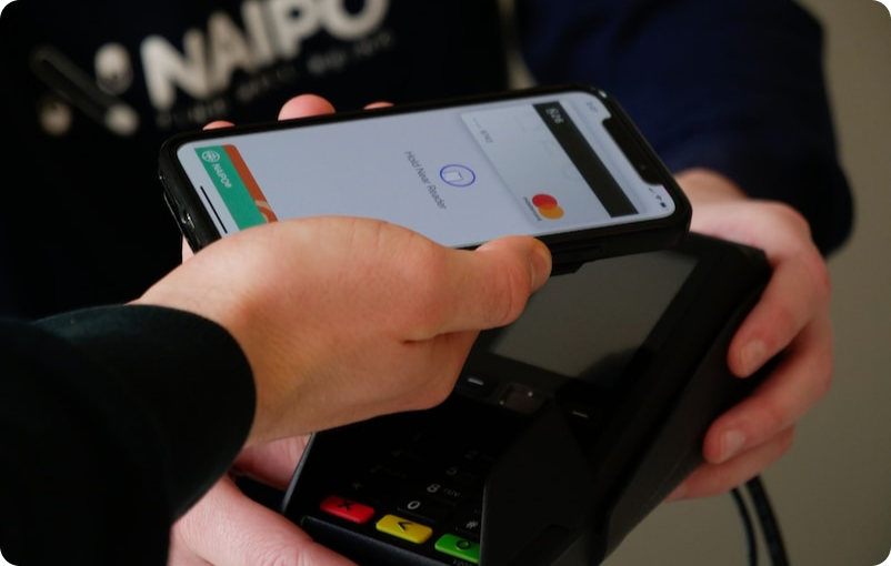 user using touch free payment processing